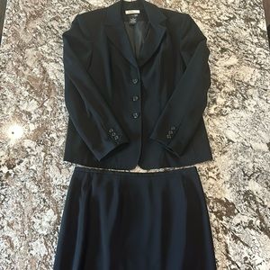 Women’s blazer and knee-length skirt